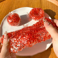 Pomegranate Crunch Squishy Ball